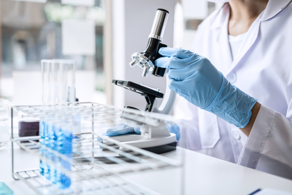 Scientist,Or,Medical,In,Lab,Coat,Working,In,Biotechnological,Laboratory,